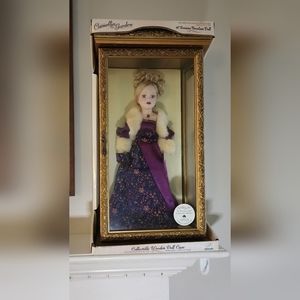 Brass Key Porcelain Doll